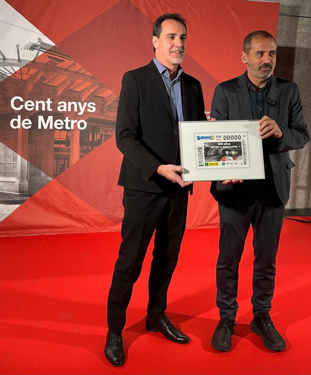 Enric Botí i Xavier Flores amb el cupó.